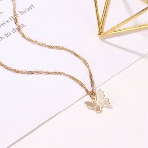 Small gold butterfly pendant necklace